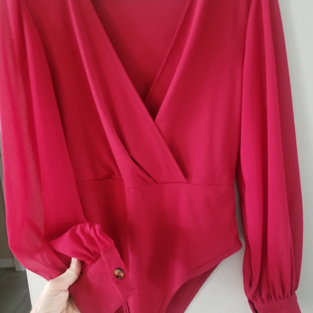 Red bodysuit.